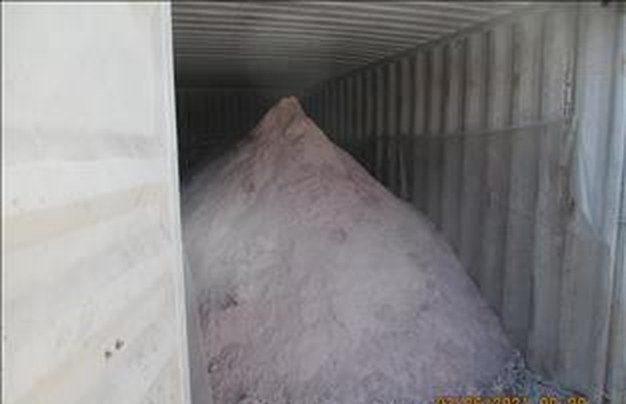 Fluorspar loaded in bulk into a shipping container
